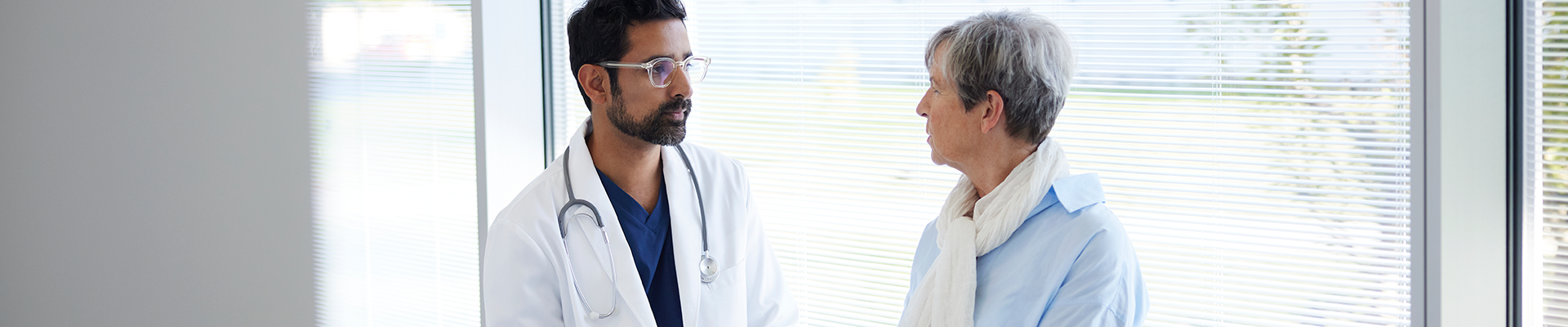 A doctor talking to his patient