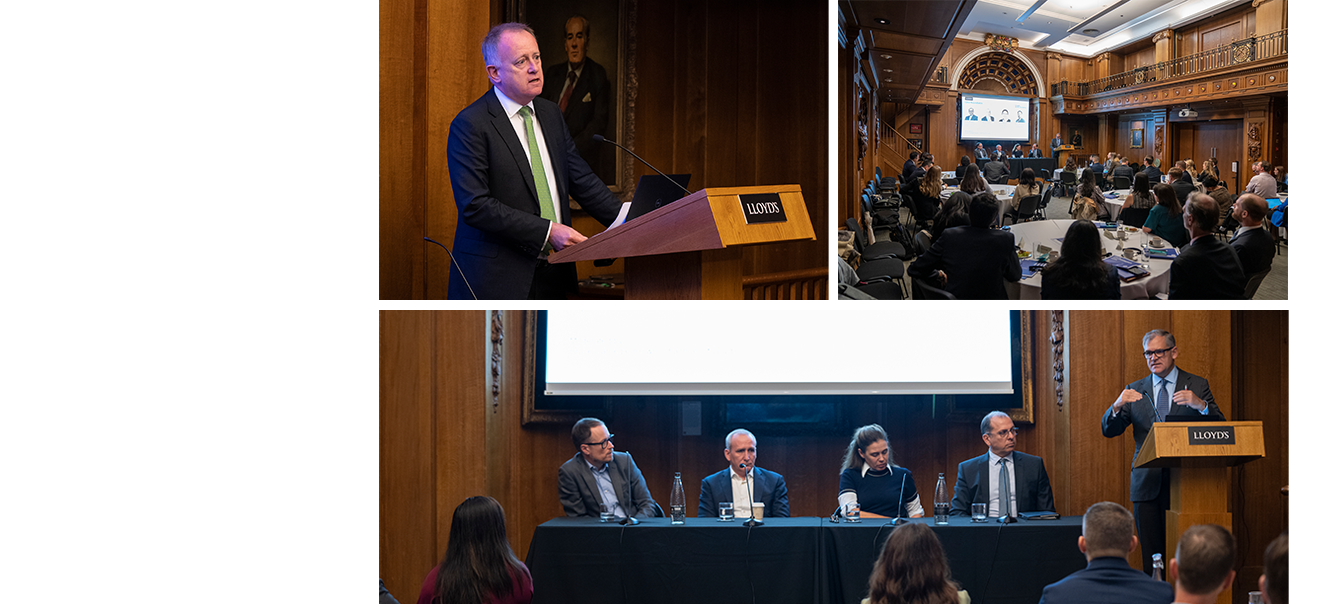 Three images, one shows Lloyd's CEO John Neal delivering a speech. Another shows the delegates seated at tables in the Old Library facing the panel at the front of the room, the room is covered in wooden paneling with high ceilings. The third image of of the 4 members of the panel, sat at a long table facing the audience. Bruce Carnegie-Brown, Chairman of Lloyd’s, is stood on the right of the table and is speaking.