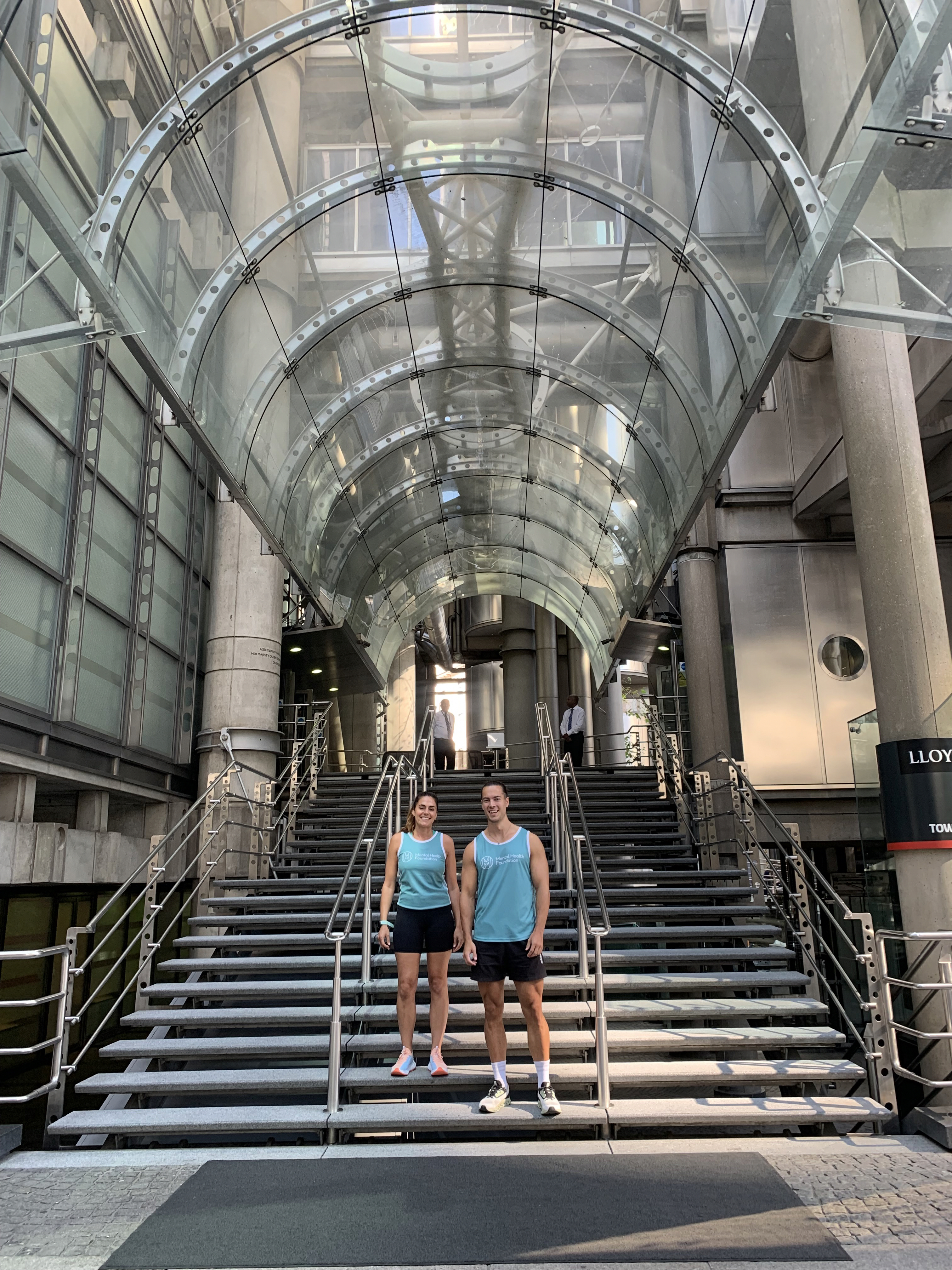 Annie and Max outside the Lloyd's building