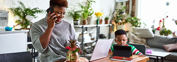 A worker working from home with a child