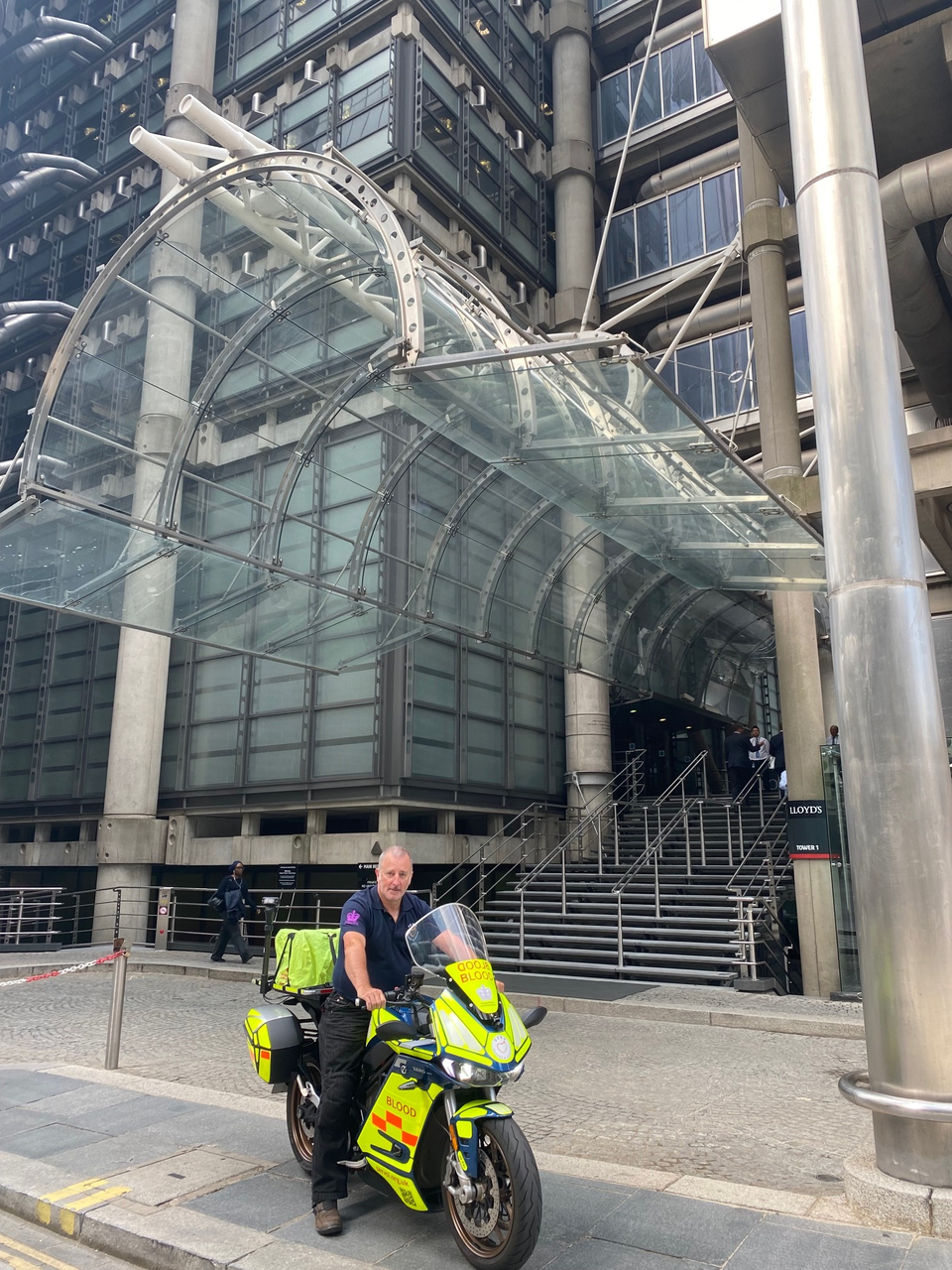 Marcus Simeoni on Bolt outside the Lloyd's building