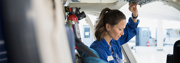 Worker in an aeroplane cockpit