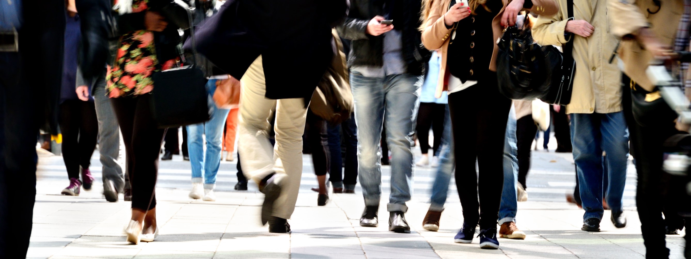 People walking on a pavement